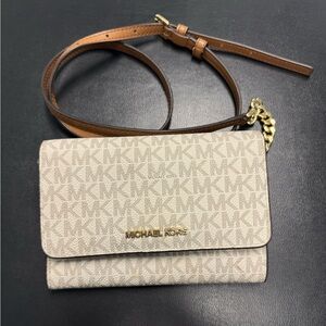 Michael Kors Crossbody purse/wallet.